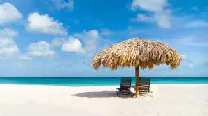 beach and sky, chairs under a palapa